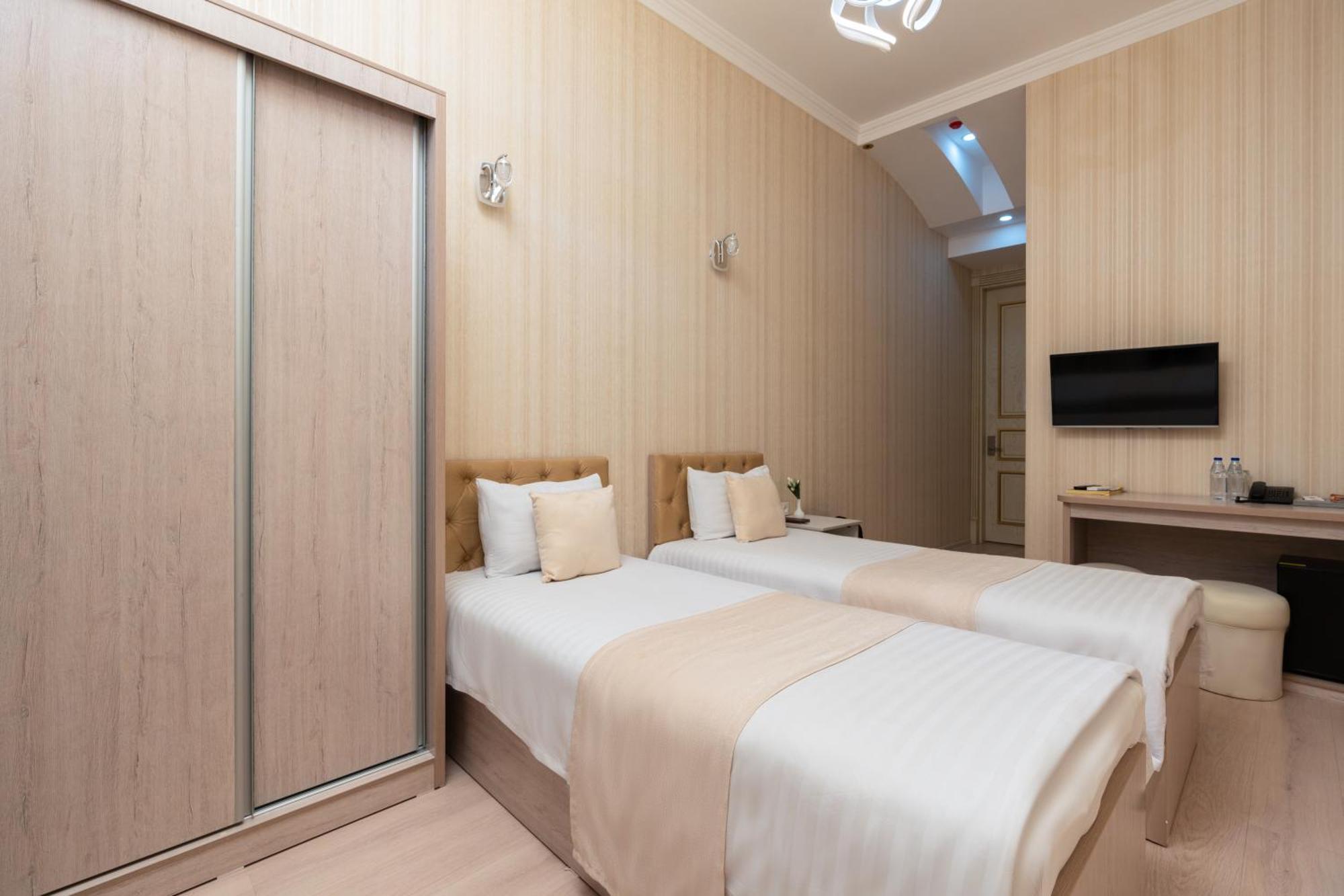 Shoxjahon Hotel - 600 Mbps Internet ทาชเคนต์ ห้อง รูปภาพ